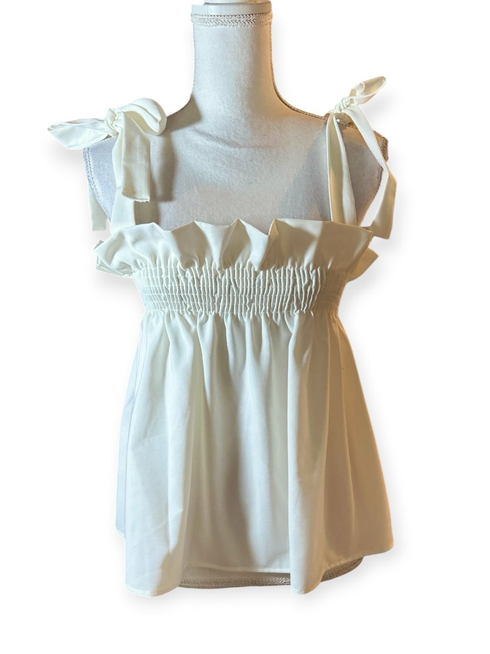 Vici Tie-Shoulder Ruffle Smocked Top in Cream
